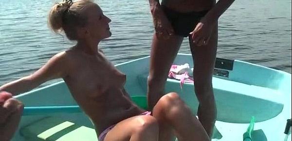  Blonde fucked hard in a boat on the lake three guys